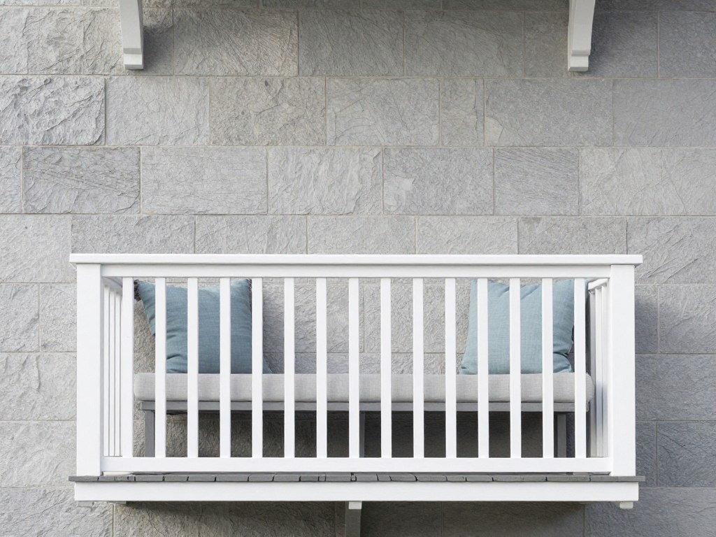 Balcony with neutral design and subtle blue accent cushions