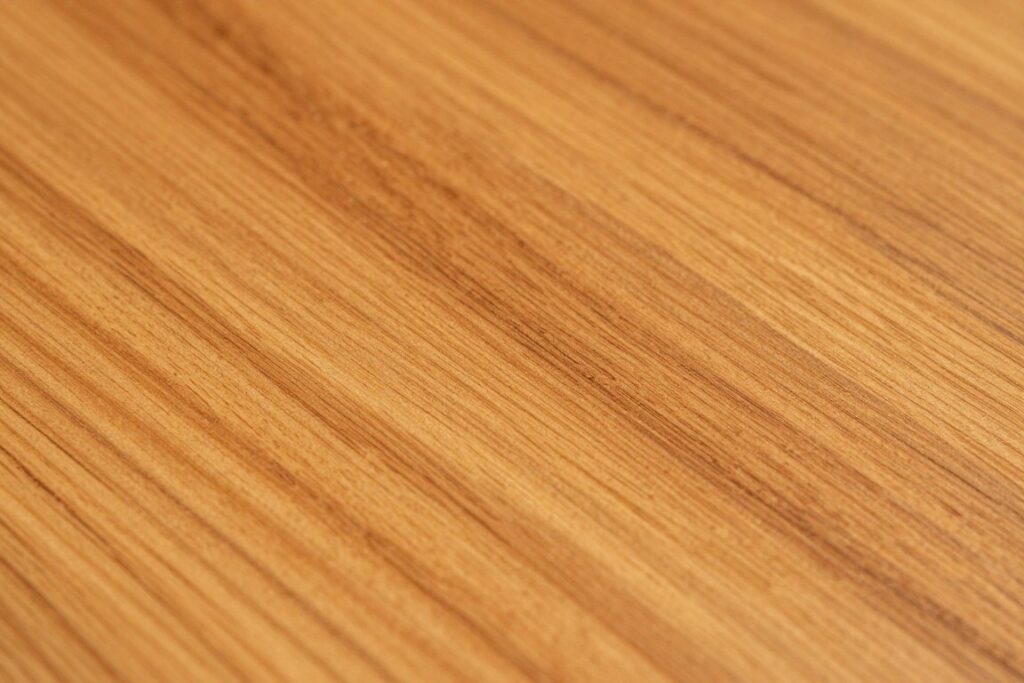 Close-up of teak wood grain and natural finish, NO PEOPLE, NO HUMANS, NO HANDS