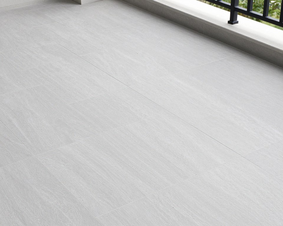 Stone tile flooring on balcony with natural texture